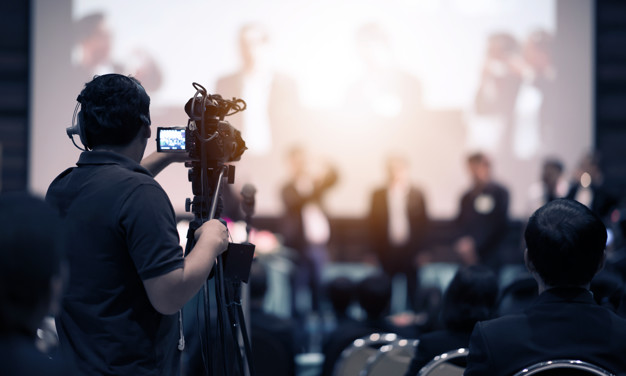 video camera operator working with his equipment indoor event 44344 333